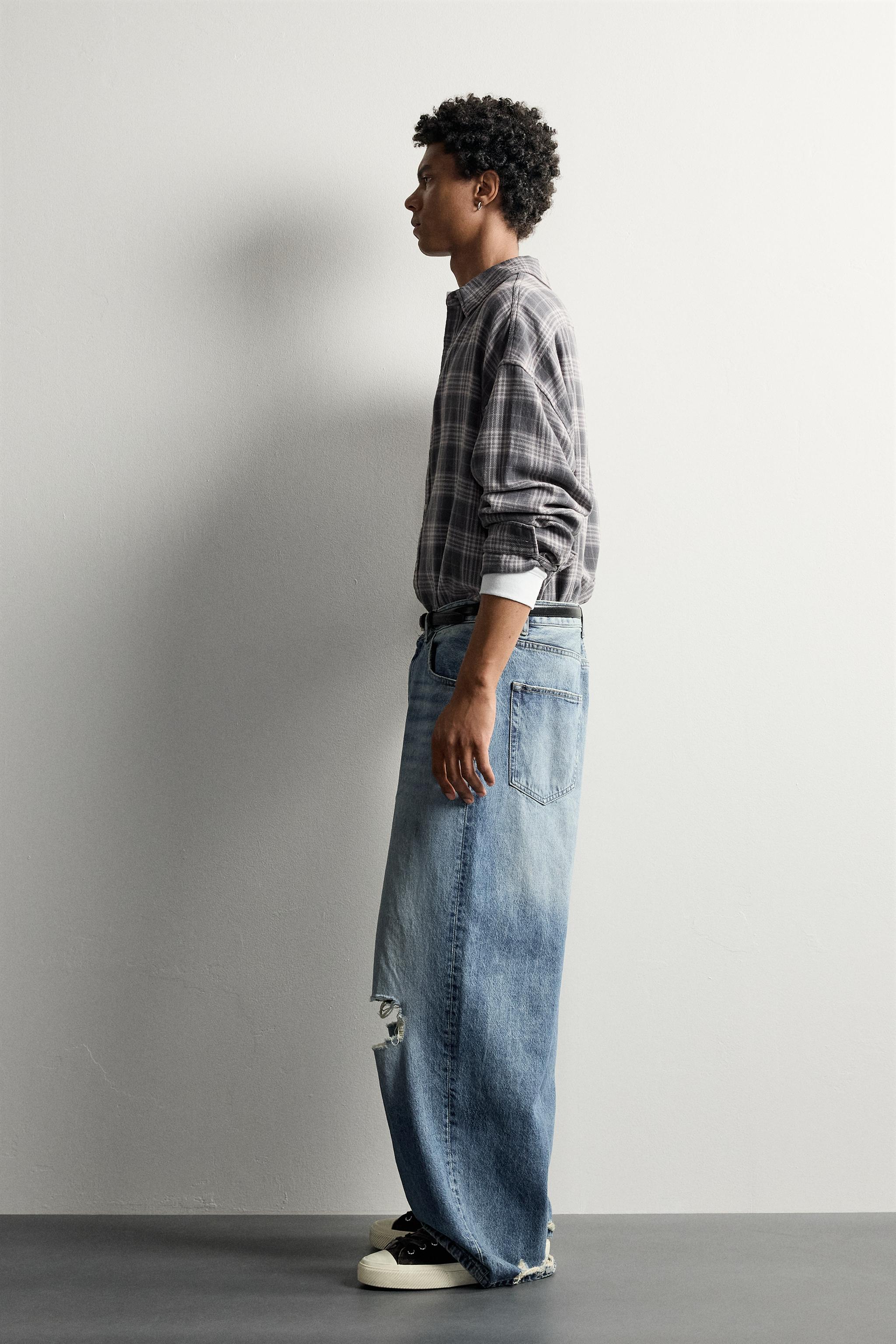DISTRESSED BAGGY FIT JEANS